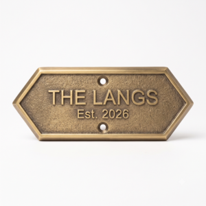 sand-cast brass family name plaque with raised lettering front view